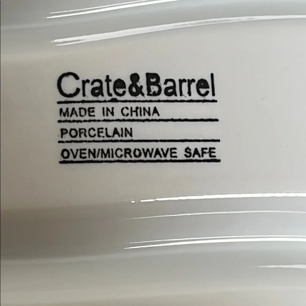 Crate & Barrel White Porcelain Curved Olive Tray